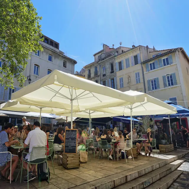 A lively café terrace in the Panier district of Marseille