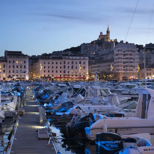 The Old Port and Notre Dame de la Garde in the evening