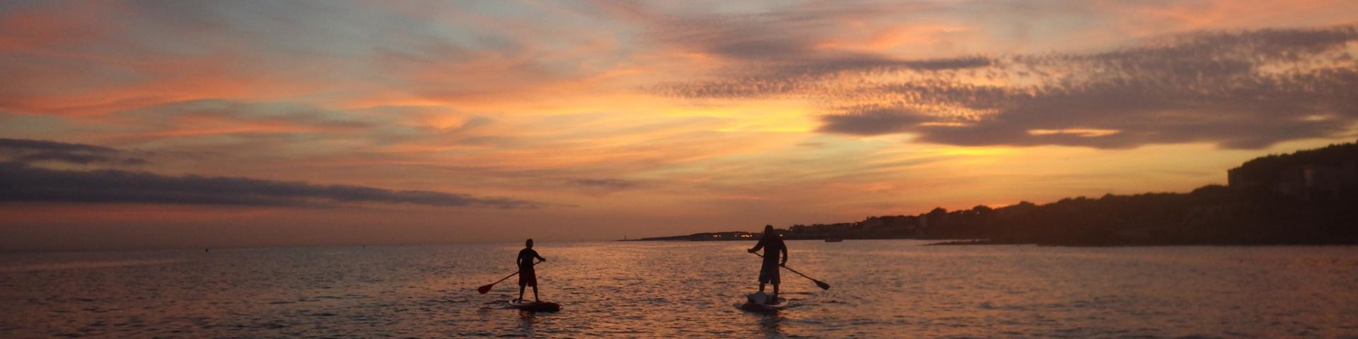 Paddle Au Coucher Du Soleil