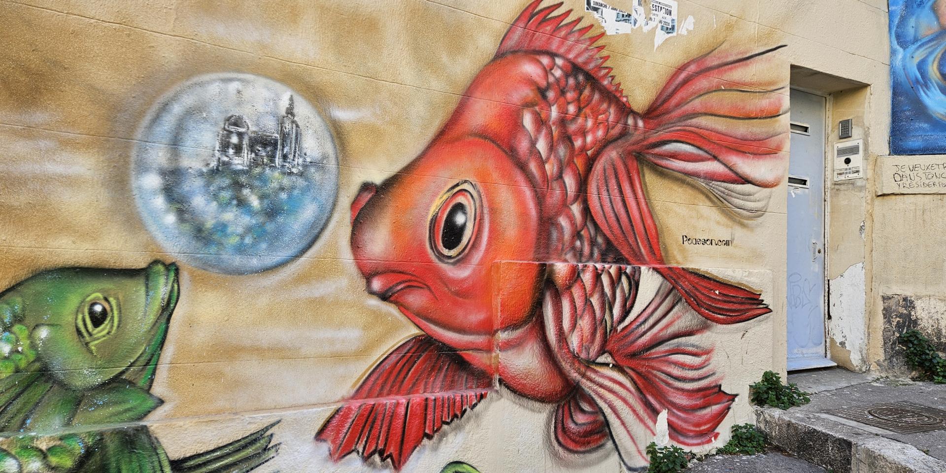 Street Art in marseille in the Panier District. Goldfish on the wall.